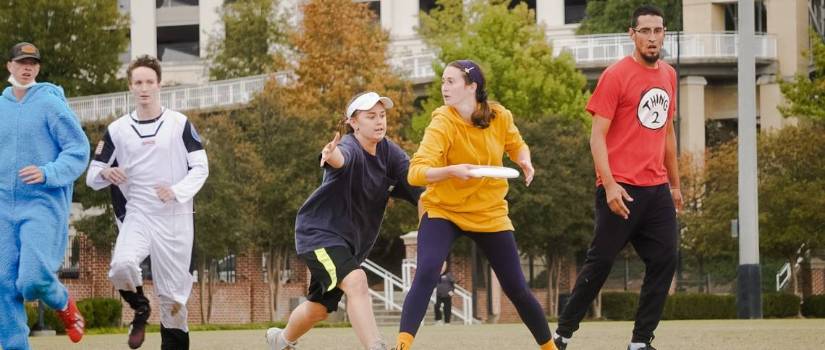 Students playing ultimate frisbee
