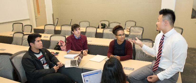 Photo of students checking in at orientation