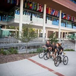 student on bicycles at business school