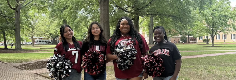 2025 Team Leaders posing for a photo outside