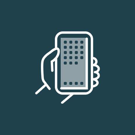 hand grasping a smartphone on a blue background