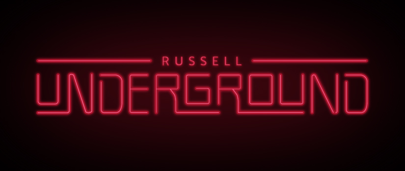 A red neon sign reads "Russell Underground".