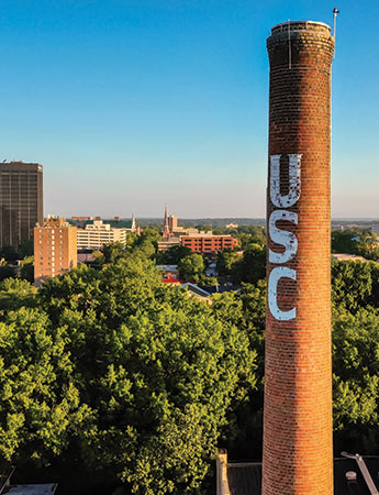 Skyline of Columbia with the USC smokestack in the foreground.