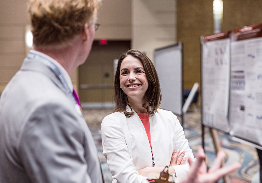 Person at Discover USC with a proud smile on their face.