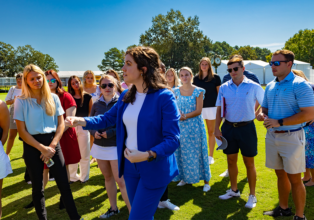 Students walking outside on a field trip to Quail Hollow.