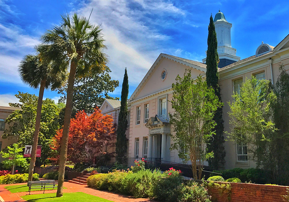 Osbourne Administration building with a bright blue sky behind it.