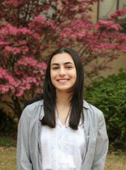 Shaiman headshot Sophia flowers background