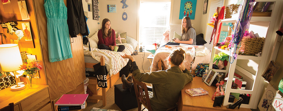 Girls talking in their dorm room