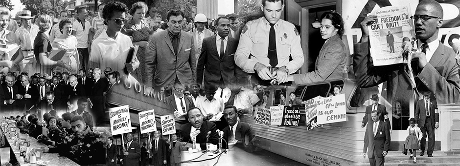 Students walking and sitting outside a building on campus.
