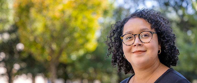Woman smiling with black jacket on
