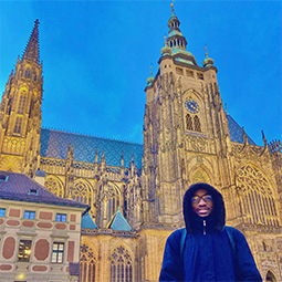 Student posing in front of building in Germany