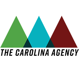 The Carolina Agency Formal logo - three slightly overlapping triangles, side by side, in the following order from left to right; Green, Blue and Red. Where the triangles overlap it is colored Black. Beneath the triangles is written The Carolina Agency.