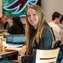 female student smiling in the cafe