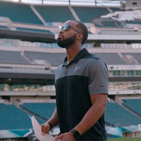 Brandon Ruth stands overlooking the Philadelphia Eagles football stadium.