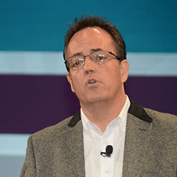 Jim Aaron Jim Aaron giving a speech in front of an audience