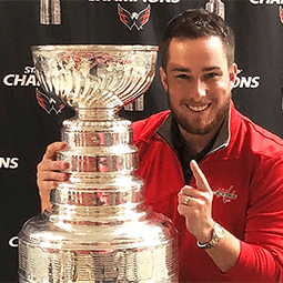 Glen Ivol Glen Ivol stands with the NHL trophy after the Washington Capitals are crowned champs