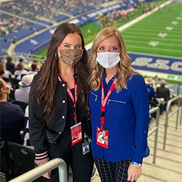 Maddie Ballengee Maddie Ballengee stands with a colleague during a Dallas Cowboys game
